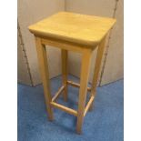 A light-ash bar stool in nice condition