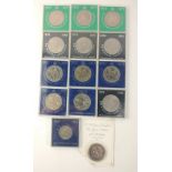 A quantity of twelve cased commemorative crowns plus a 1990 Queen Mother £5, 1961 half dollar