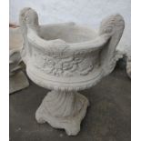 A stonework double-handled urn on a plinth, in 2 pieces, 60cmH x 38cm dia - brand new item