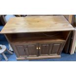 A solid pine media cabinet suitable for a tv, storage and sky box etc - dimensions 86cm width x