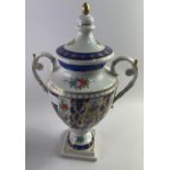 A floral and gilt lidded urn, possible VOLKSTED, standing approx 36cm tall, no visible damage