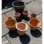 Add colour to your patio with these seven various sized TERRACOTTA pots plus a larger plastic pot.
