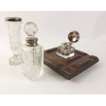 A delightful collection of silver and white metal items to include a cut glass violet flower vase