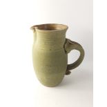 A large studio pottery DOUGLAS DAVIES jug standing 27cm high