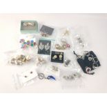 A mixed lot of costume jewellery and vintage-style earrings - both clip-on and for pierced ears -