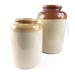 A pair of STONEWARE JARS with a small hairline in each jar