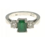 PLATINUM hand-made ring with a stunning EMERALD 0.89ct flanked by two round brilliant cut diamonds