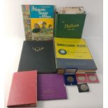 Five stamp albums with 20th century stamps from around the world including overseas first day covers