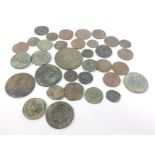 A quantity of collectable older treasure trove coins of various ages and locations awaiting a new