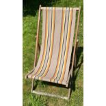 An ICONIC vintage striped garden deck chair