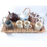 A TEA-FOR-TWO OR THREE OR FOUR collection to include a wicker-woven tea tray measuring approx