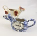 A delightful pair of MILK-POURING CERAMIC COWS! A floral blue and white Frederick Rathbone Burgess