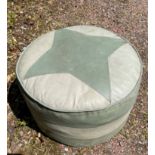 RETRO A green leather style c1950's pouffe with a star shaped design