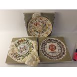 Three boxed WEDGWOOD 26cm display plates to include 1974, 1975, 1976 calendars