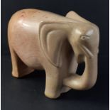 A wonderfully tactile soapstone ELEPHANT standing approx 13cm high, length approx 20cm, no chips