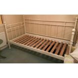 A white framed day bed - we have a mattress to fit brand new still in wrappers for £45 extra -