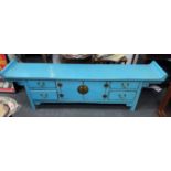 An UNUSUAL ORIENTAL low wall table or suitable as a media/TV cabinet in a blue distressed style