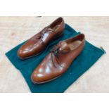 A pair of CROCKETT & JONES brown Dartmouth lace-up shoes size 8.5F, in good condition