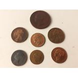 A small lot of seven Victorian coins / tokens of numismatic interest to include heavily tone 1853