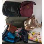 A small selection of bags to include a tan leather crossbody bag, a day bag rucksack, a soft-sided