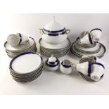 AN ELEGANT REAL COBALT and GILT "POESIE" dinner and tea set from LORENZ HUTSCHEN REUTHER of