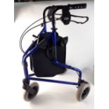 A three wheeled walking aid by Days Patterson Medical