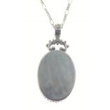 A double-sided mother of pearl and silver hallmarked pendant (3cm long) on a 375 stamped chain