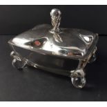 A glass dressing table trinket box with a four leaf lid made by the INTERNATIONAL SILVER COMPANY