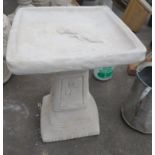 A classic style square stonework birdbath adorned with a rose, in two pieces 40cm x 40cm x 51cm H