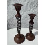 Two unusual finely made metal candlesticks from Hong Hong 32cm and 25cm high