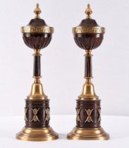 A beautiful pair of very fine brass mantle ornaments which are finished with a brown patina