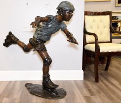 This hand cast bronze art sculpture of a skater stands just under 4ft high