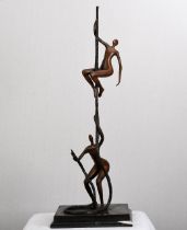 This striking art sculpture of two climbers on a rope has been cast from bronze with the climbers