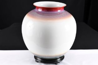 A beautiful large white porcelain oriental art vase with very skilful colouring and glazing