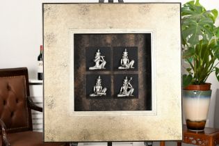 A set of four box framed Buddhas each set on their own plinth