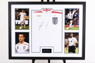 A very nicely framed England shirt which has been personally signed by JOHN TERRY & FRANK LAMPARD