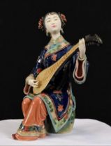 An original hand made Shiwan Oriental Geisha Lady made from very fine porcelain