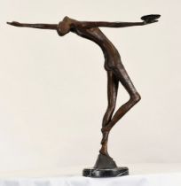 This heavy modern minimalist sculpture has been cast from bronze and sits on a black marble base