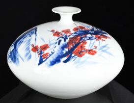 A stunning hand made Oriental porcelain art small neck vase which has embossed detail and fully