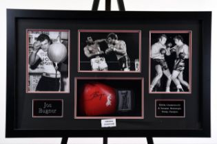 A very well framed boxing glove signed by the heavyweight boxer JOE BUGNER