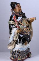 An original Shiwan figure with intricate and colourful hand decoration Origin Foshan Guangdong