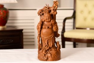 A Buddha which has been wonderfully carved from once piece of sandalwood