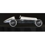 A fabulous large hand cast heavy aluminium "Speedster" car which has been highly polished by hand