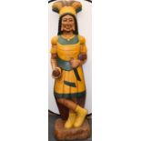 A very heavy and large hand carved solid wooden Indian with hand coloured detailing