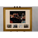 A framed presentation incorporating a photograph of the famous fight between FRANK BRUNO & LENNOX