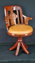 A handmade solid Rosewood swivel chair with hand carving