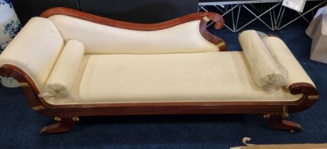 A beautifully upholstered hand made solid rosewood chaise longue