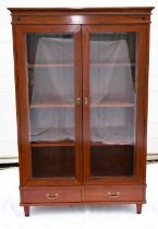 A rosewood document cabinet/bookcase