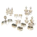 A selection of silver cruet sets,