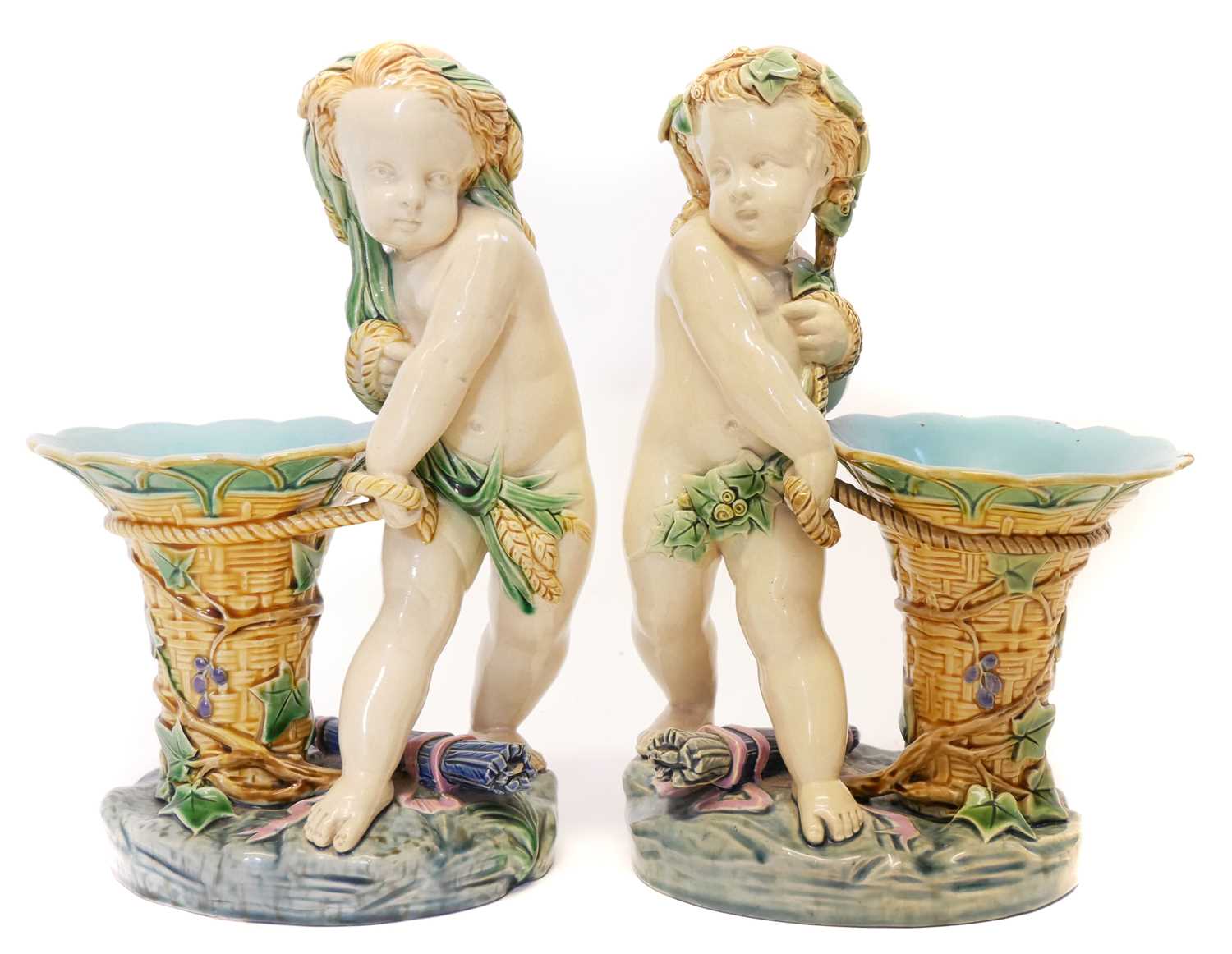 Pair of Minton majolica figure vases